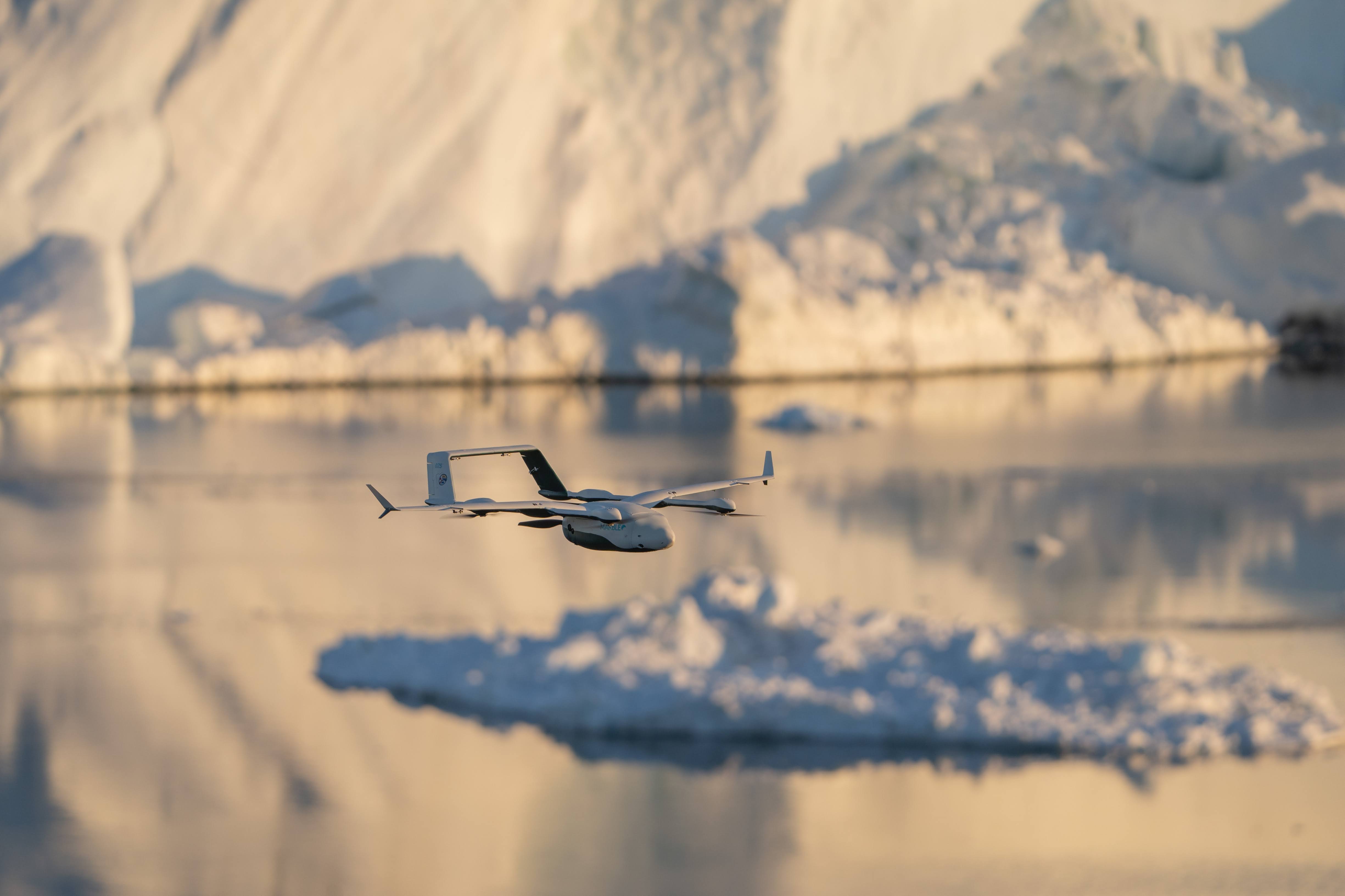 Drone flying above a melting glacier in Greenland