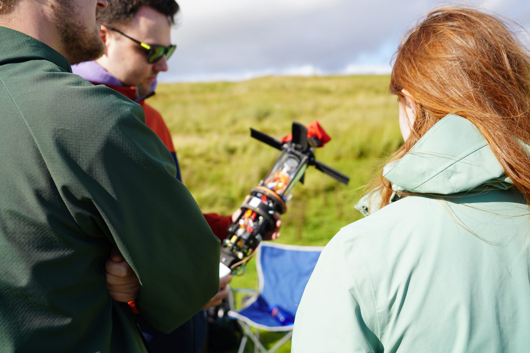 Payload electronics being inspected outdoors